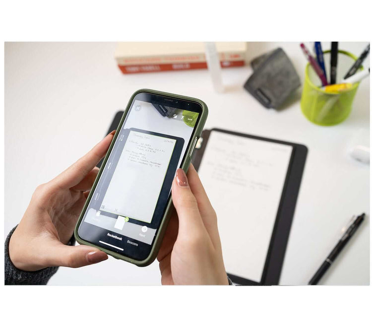 woman scanning Rocketbook Pro with her phone